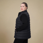HHE plus size women's puffer vest in classic black, warm and comfortable sleeveless outerwear, front view.